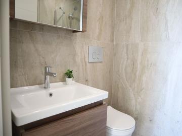 fully-tiled-bathroom