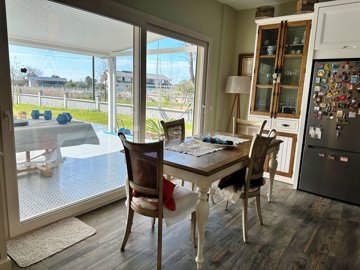 Serene Dalyan Duplex Villa For Sale - Dining area with beautiful garden views