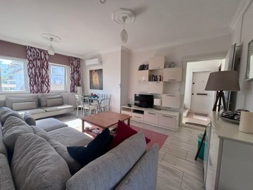 Beautifully Maintained 1-Bed Apartment For Sale In Gulpinar, Dalyan - Spacious fully furnished lounge