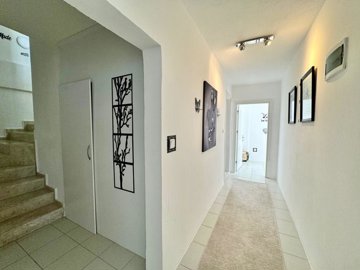 Blissful Detached Villa For Sale In Uzumlu, Fethiye - Bright and airy hallway with a marble staircase