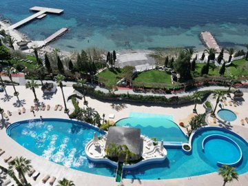 Idyllic Sea View Apartment In Gumusluk, Bodrum For Sale – Shared pools and facilities