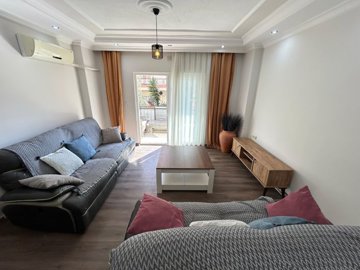 A Beautifully Renovated Apartment For Sale In Didim - Comfortable living room