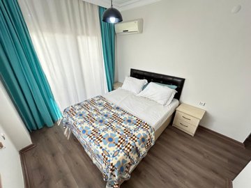 A Beautifully Renovated Apartment For Sale In Didim - Large master bedroom
