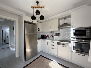 Luxurious Renovated Villa For Sale In Milas, Bogazici - A stylish modern kitchen