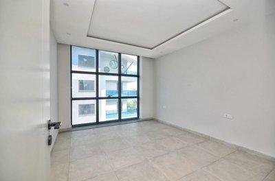 Tastefully-Designed Apartment For Sale In Alanya - Bright and light bedroom