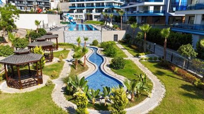 Tastefully-Designed Apartment For Sale In Alanya - Gorgeous landscaped gardens
