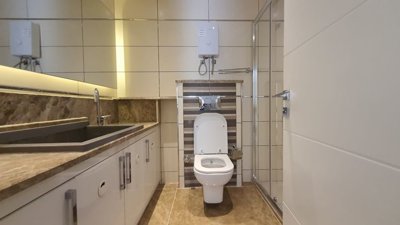Must-See Property For Sale In Side - Luxury bathroom with storage