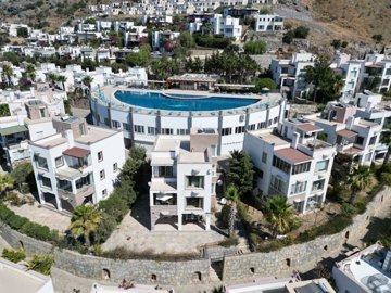 Sea View Triplex Bodrum Villa For Sale In Koyunbaba, Gumusluk - Arial view showing the entire complex