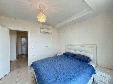 Key-Ready Luxury Apartment In Alanya - Bedroom with air conditioning