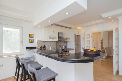 An Alluring Hillside Villa In Alanya For Sale - Kitchen with breakfast bar 
