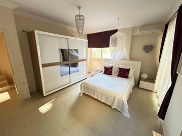 Sea View Apartment For Sale In Didim - Master bedroom with a balcony