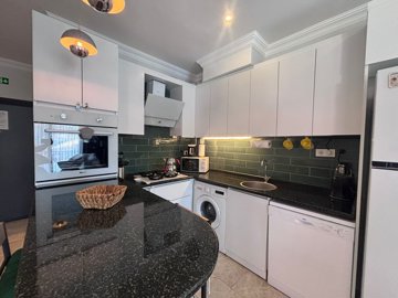 A Stylish Dalyan Bungalow For Sale With A Private Pool & Garden - Chic kitchen with a breakfast bar