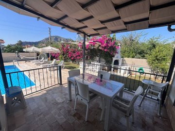 A Stylish Dalyan Bungalow For Sale With A Private Pool & Garden - Poolside terrace from the living area