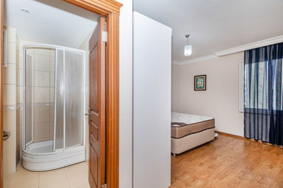 Exquisite Apartment For Sale In Alanya – Looking into the master bedroom