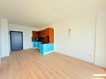 Beautiful Garden Apartment For Sale In Milas, Mugla - Lounge to the kitchen