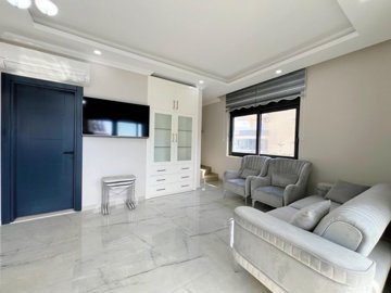 Sea View Alanya Penthouse For Sale With A Shared Pool - Entrance, lounge and staircase