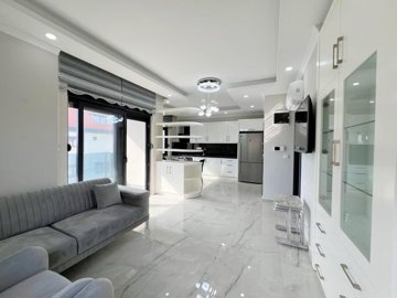 Sea View Alanya Penthouse For Sale With A Shared Pool - From the lounge to the kitchen