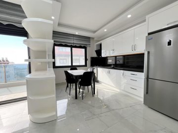 Sea View Alanya Penthouse For Sale With A Shared Pool - Kitchen and compact dining space