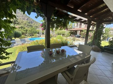 Ready-To-Move Dalyan Villa For Sale With Communal Gardens & Pool - Shady covered terrace