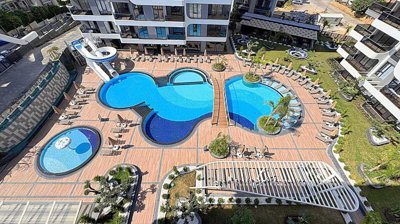 Indulgent One Bedroom Apartment For Sale In Alanya – Communal swimming pools and terraces