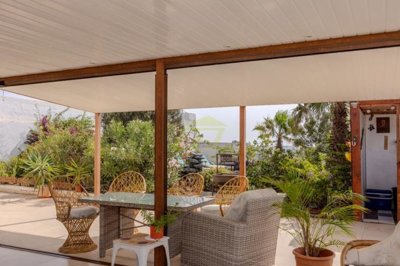 Tranquil countryside villa with panoramic views, spacious living, and mature gardens