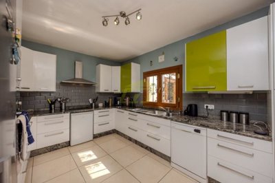 Tranquil countryside villa with panoramic views, spacious living, and mature gardens