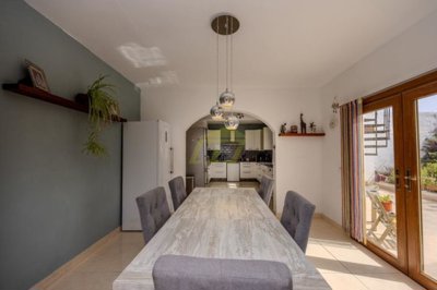 Tranquil countryside villa with panoramic views, spacious living, and mature gardens