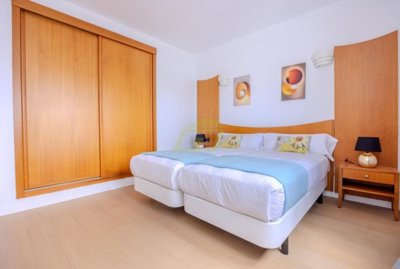 Front line bungalow with communal pool at Coral Beach in Playa Blanca