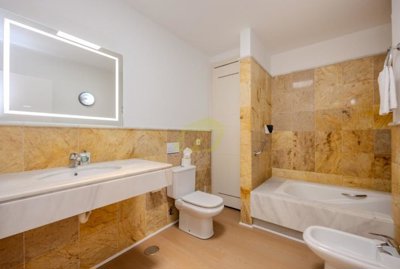 Front line bungalow with communal pool at Coral Beach in Playa Blanca