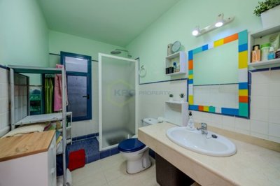 Spacious Playa Blanca villa with pool, guest apartment, and potential.